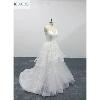 Beyaz Dantel Aplikler Tül V Yaka Spagetti Sapanlar Kolsuz Kat Uzunlukta A-Line düğün elbisesi Şapel Tren Custom Made